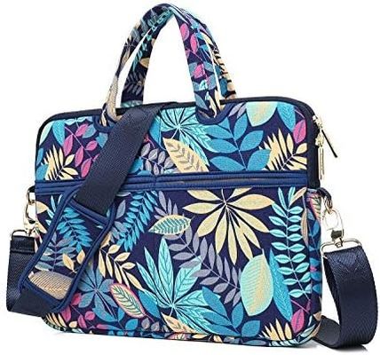Laptop bag designed for 12.5 to 14 inch laptops with padded interior printed canvas fabric and multiple carrying options