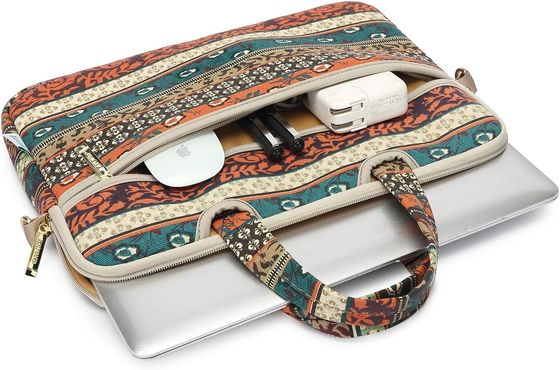 Laptop bag designed for 12.5 to 14 inch laptops with padded interior printed canvas fabric and multiple carrying options