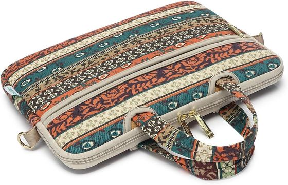 Laptop bag designed for 12.5 to 14 inch laptops with padded interior printed canvas fabric and multiple carrying options
