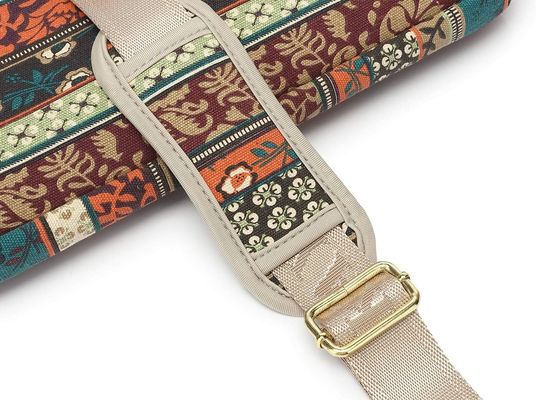 Laptop bag designed for 12.5 to 14 inch laptops with padded interior printed canvas fabric and multiple carrying options