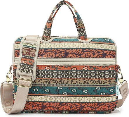 Laptop bag designed for 12.5 to 14 inch laptops with padded interior printed canvas fabric and multiple carrying options