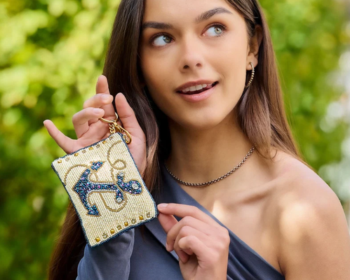 Hooked Up Coin Purse Eye catching butterfly coin bag with bold beadwork floral patterns playful tassel key ring and zipper closure perfect for small essentials
