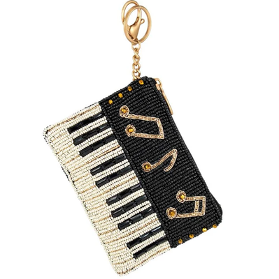 Play it Again Coin Purse Eye catching butterfly coin bag with bold beadwork floral patterns playful tassel key ring and zipper closure perfect for small essentials